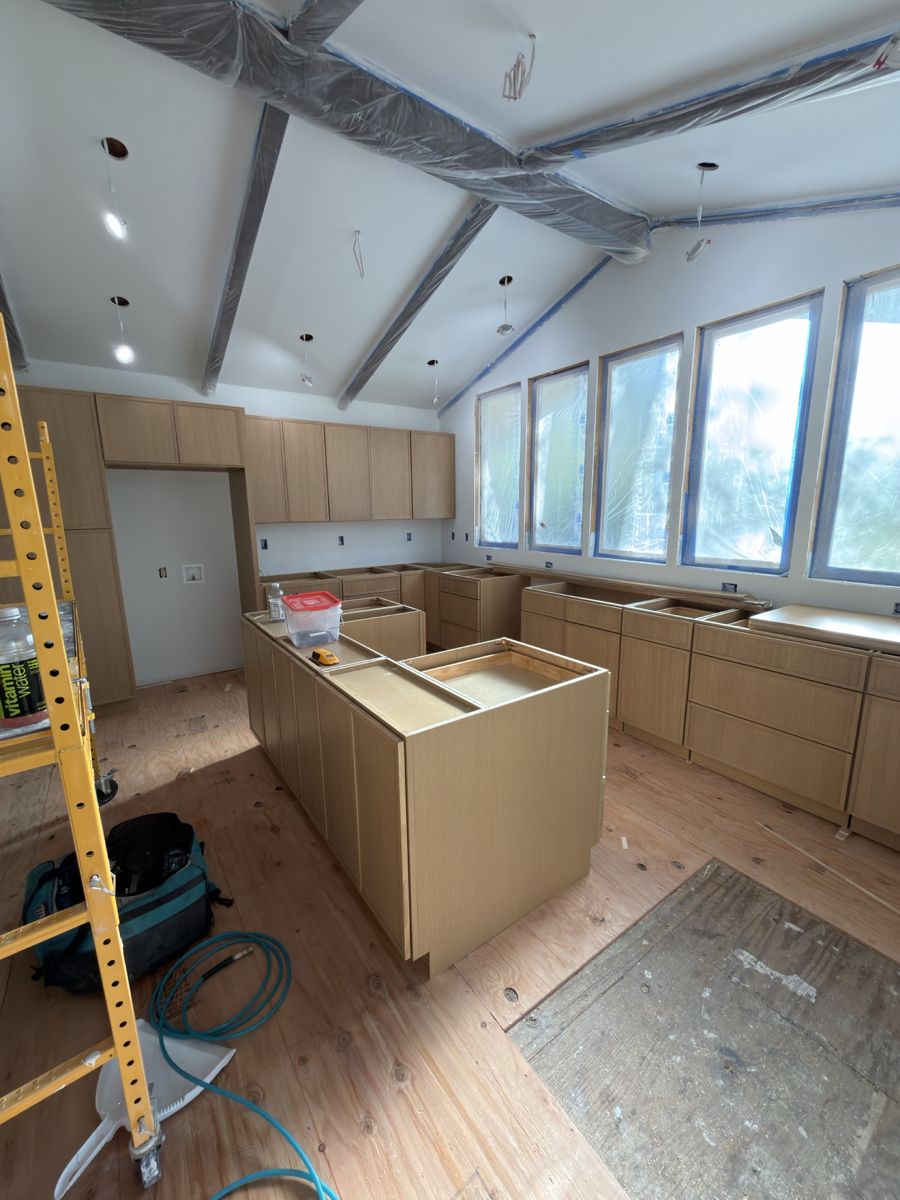 Frameless oak cabinets in a vaulted kitchen